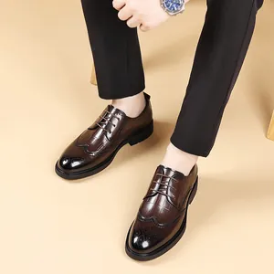 Elegant brown leather brogue oxfords for men, perfect for business or wedding occasions