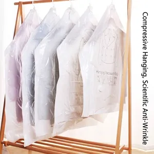Heavy duty transparent hanging vacuum storage bags for clothes on a wooden garment rack