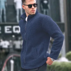 Casual men's navy blue fleece jacket with stand collar and full zipper closure.