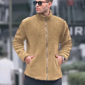 Detailed view of men's camel sherpa fleece jacket featuring full zipper and stand collar.