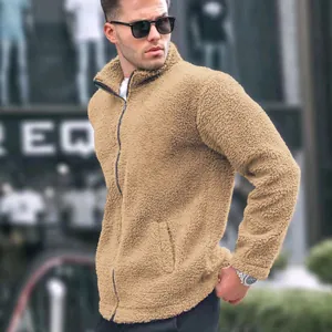 Close-up of khaki teddy fleece zip-up jacket for men showing soft texture