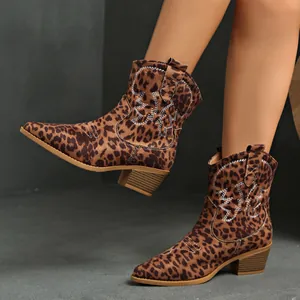 Stylish leopard print suede western cowboy boots with pointed toe and block heel.