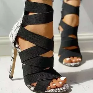 Sexy Roman style high heel sandals with black elastic straps and snakeskin pattern