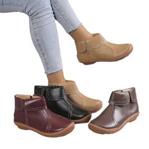 Comfortable round toe faux leather ankle boots with side zipper and stitching detail