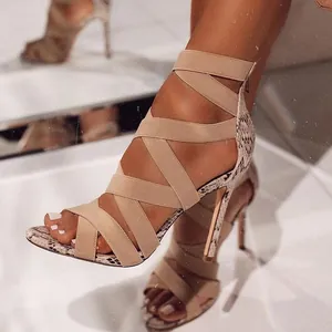 Roman-style high heel sandals with elastic straps and back zipper for a stylish summer look.