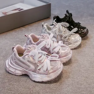 Sparkling children's chunky sneakers with rhinestones in pink, silver and black colors.