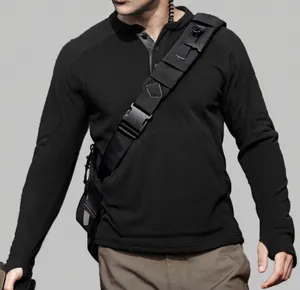 Detail shot of men's slim black long-sleeved sweatshirt with tactical strap.