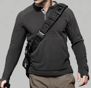 Close-up of slim fit charcoal grey fleece sweatshirt featuring tactical thumbhole cuffs