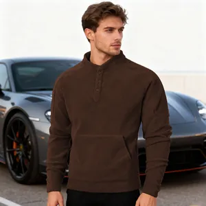 Close-up of men's brown fleece sweatshirt with stand collar and buttoned placket