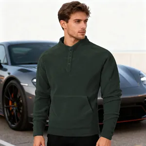 Detailed view of men's dark green fleece sweatshirt with buttoned stand collar