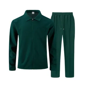 Detailed view of dark green waffle knit men's tracksuit set featuring a zip-up jacket