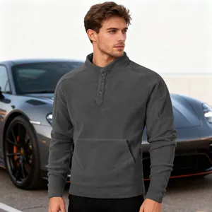 Close-up of a men's dark grey slim-fit fleece sweatshirt with stand collar and buttons.