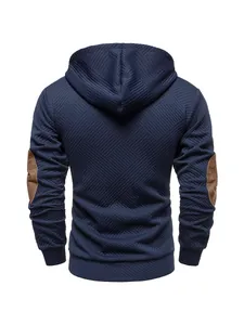 Detailed back view of a navy blue textured long-sleeved hoodie featuring brown elbow patches