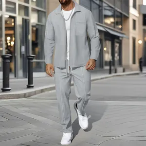Waffle-knit texture detail of grey men's two-piece zipper jacket and pants set