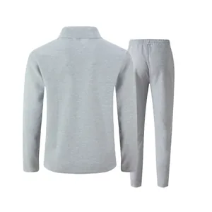 Detailed back view of men's grey waffle-knit tracksuit showcasing texture and fit