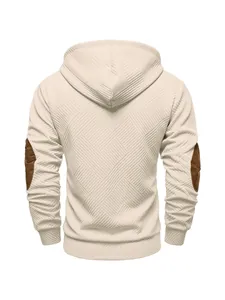 Back view of men's heavy textured cream hoodie featuring stylish brown elbow patches