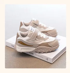 Side view of children's leather dad shoes with stylish durian sole and velcro straps