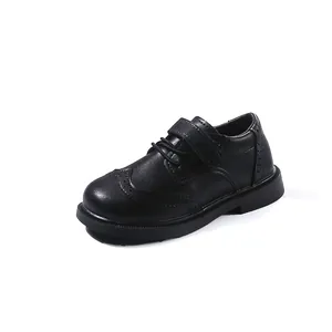 Classic boys black leather brogue shoes with velcro strap for formal school wear