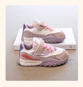 Detailed view of girls' purple chunky sneakers with durian texture non-slip soles