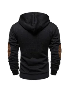 Detailed back view of a black textured heavy hooded sweatshirt with brown elbow patches