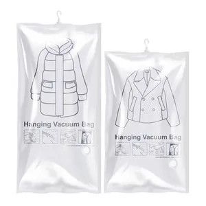 Two transparent hanging vacuum storage bags for organizing down jackets and coats.