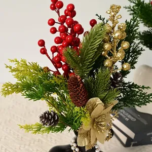 Close-up of festive Christmas floral bouquet with red berries and golden pine cones.