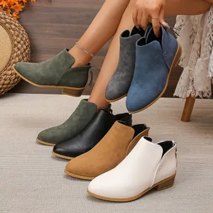 Vista detallada de botines de cuero para mujer en varios colores con tacón de bloque.
