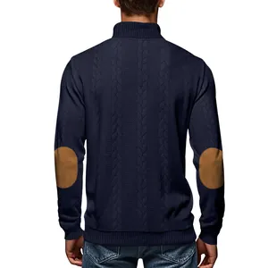 Detailed back view of navy blue cable knit sweater featuring classic brown elbow patches.