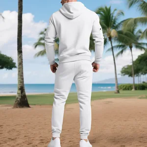 Back view of men's heavy white fleece hoodie and pants tracksuit set on a beach background
