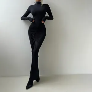 Elegant black high-neck ruched maxi dress with long sleeves for a slim fit silhouette