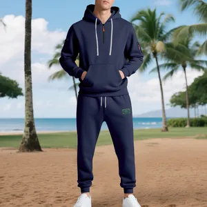 Full shot of men's heavyweight navy blue fleece hoodie and sweatpants tracksuit.