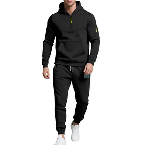 Front view of men's heavy fleece black tracksuit with neon zipper detail