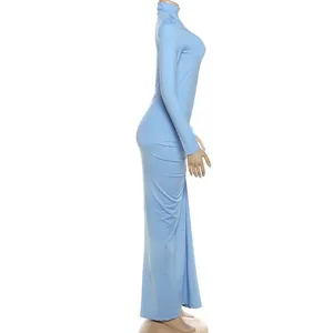 Side profile of a light blue long sleeve bodycon maxi dress with elegant ruched details