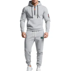 Men's heavyweight grey fleece hoodie and sweatpants set with orange zipper details