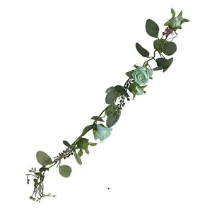 Detail view of artificial French rose vine with realistic eucalyptus leaves for decoration