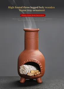 Detailed view of ceramic aromatherapy burner with white sage and palo santo wood