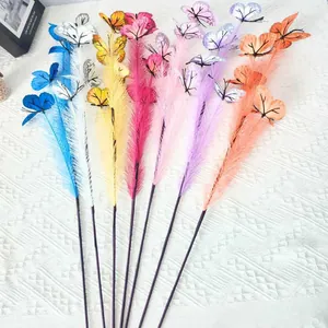 Colorful artificial reed branches with butterfly accents for home and display decor