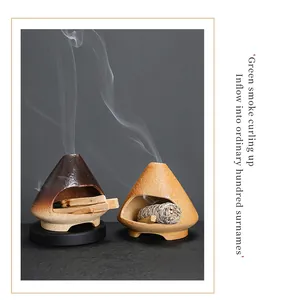Atmospheric ceramic burner for Palo Santo and white sage with curling smoke detail