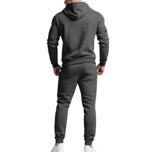Back view of heavy charcoal grey men's fleece-lined tracksuit hoodie and jogger set.