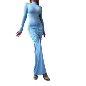 Close-up of light blue high-neck maxi dress featuring elegant ruched waist detail