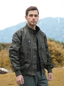 Men's olive green tactical flight jacket with military patches in outdoor setting