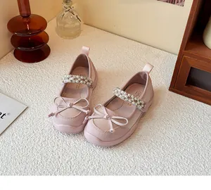 Elegant pink girls princess shoes with pearl rhinestone strap and decorative bow detail