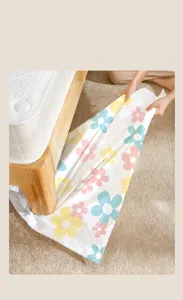 Durable vacuum storage bag with colorful sunflower pattern showing extreme strength