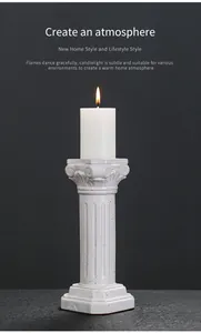 Elegant white ceramic Roman pillar candle holder for sophisticated home table decor.