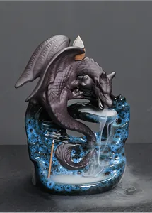 Detailed view of ceramic dragon backflow incense burner with waterfall smoke effect