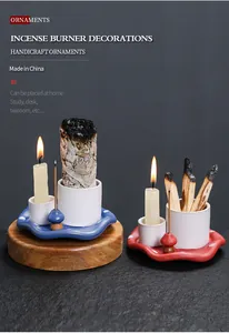 Detailed view of ceramic mushroom incense burner with sage and palo santo