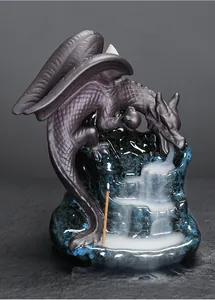 Exquisite ceramic backflow incense burner featuring a dragon on blue glazed mountain base