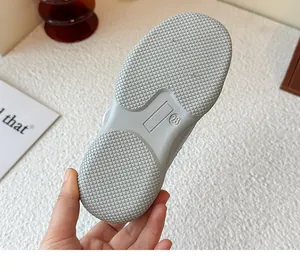 Detailed view of the non-slip rubber sole for girl's princess shoes showing size 28 mark
