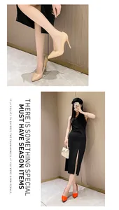 Stunning nude and vibrant orange patent leather stiletto pumps for women detail.