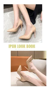 Close-up detail of nude patent leather stiletto pumps with pointed toe for women.